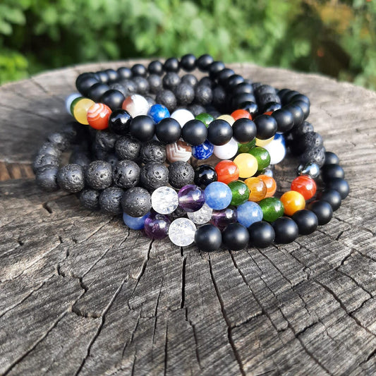 Chakrenarmband "7 AUF EINEN STREICH" - 6mm Perlen mit mattem Onyx
