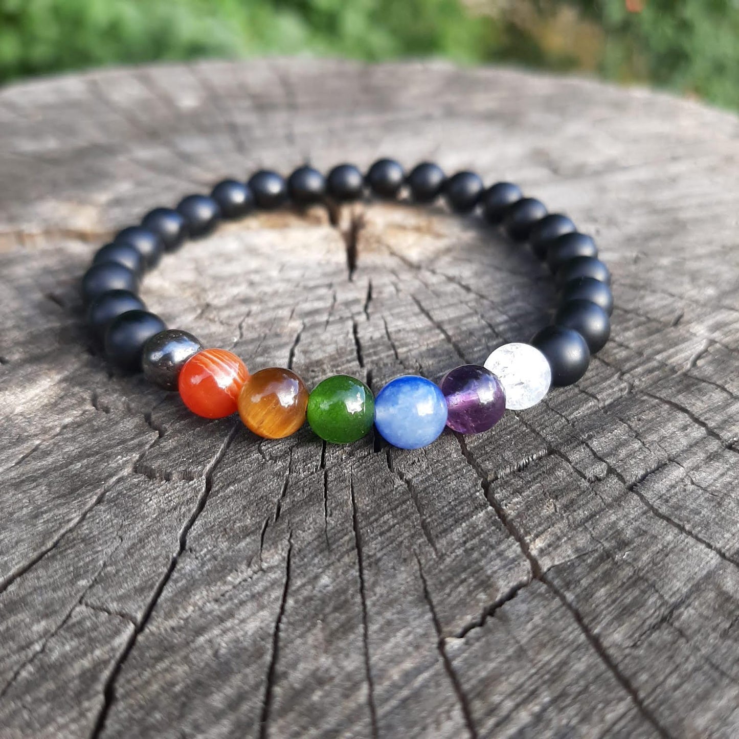 Chakrenarmband "7 AUF EINEN STREICH" - 6mm Perlen mit mattem Onyx